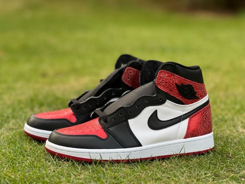 Air Jordan 1 Retro High OG Black Toe Origin Story Red